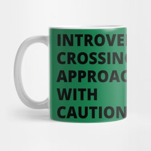 Introvert crossing approach with caution! A very funny design with the slogan "introvert crossing approach with caution". Mug